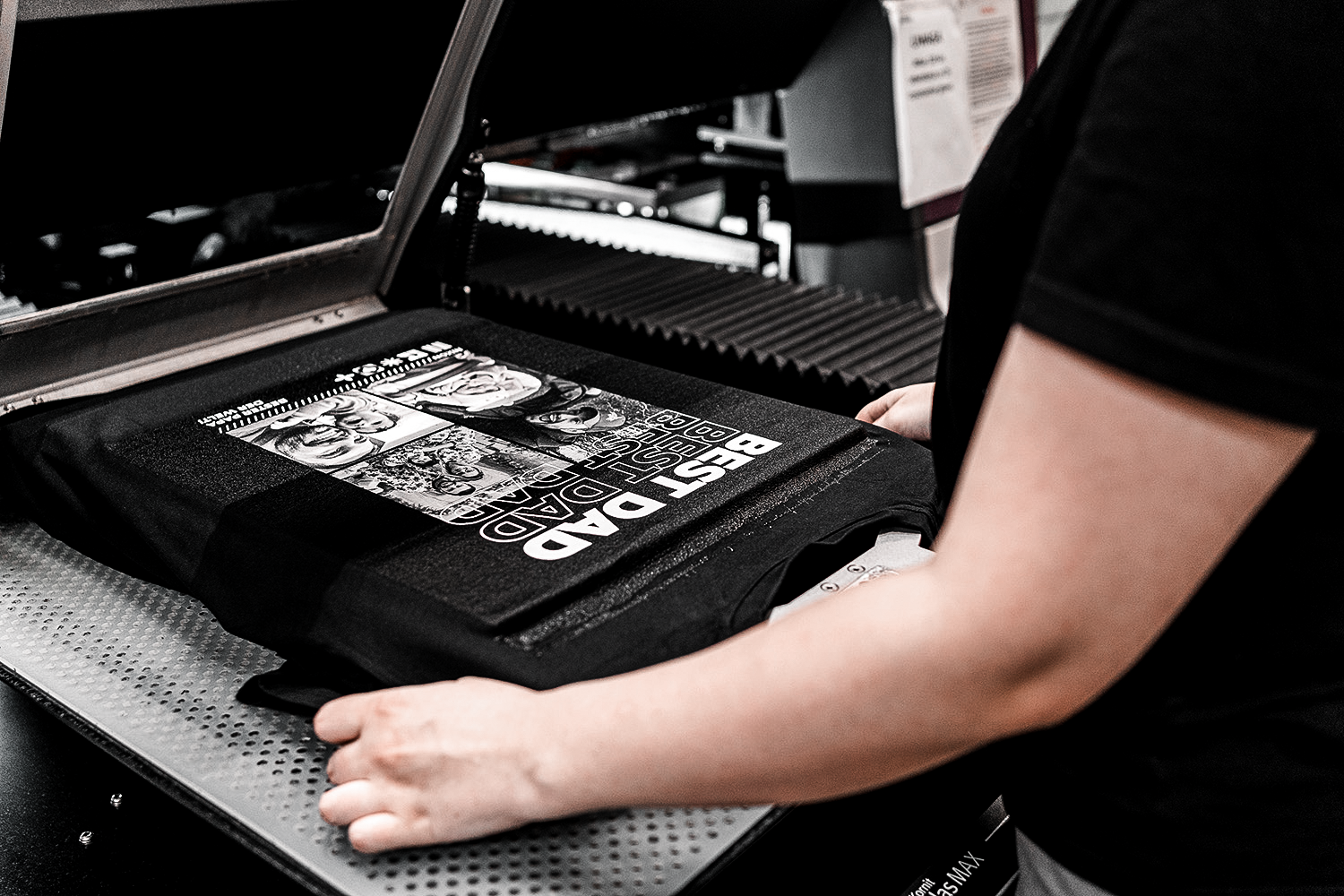 Direct to Garment (DTG) printing process using Kornit Atlas Max – high-resolution custom print on a black T-shirt