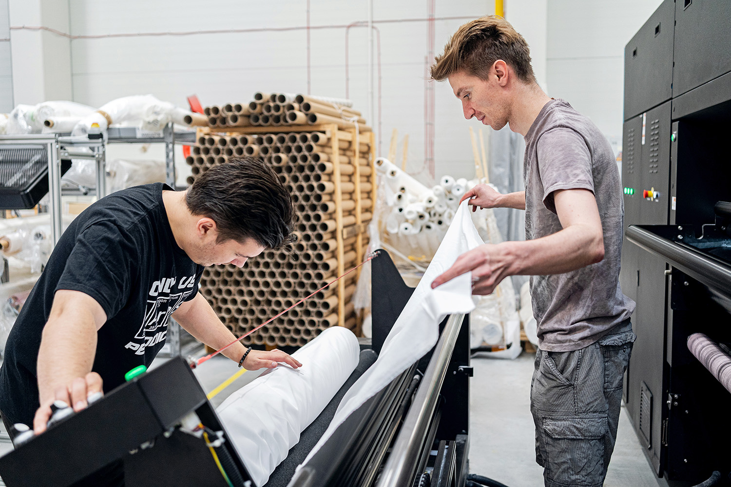 Operator working with print production equipment